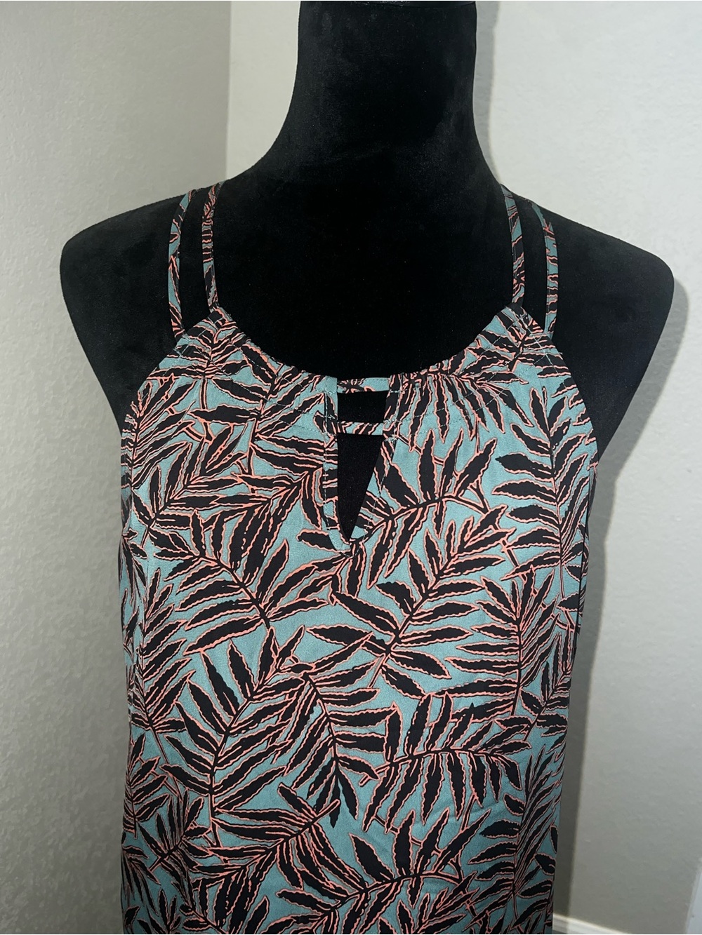 Sleeveless Halter Top in an Emerald / Mint background and Coral / Black leaves